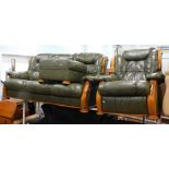 A light green leather three seater sofa, reclining armchair and footstool with wood. The upholstery