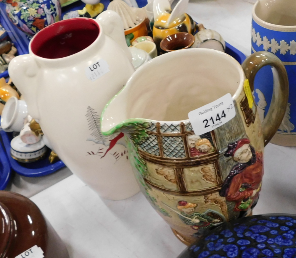 Two jugs, comprising a Crown Devon Winter Fieldings pattern vase, 23cm high, and a Beswick Falstaff