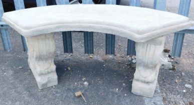 A reconstituted stone garden bench, on squirrel design plinths, on straight seat, 43cm high, 93cm wi