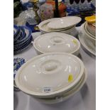 Various cream finish Vitrex ironstone Wood & Sons tureens and covers, and a small group of serving p