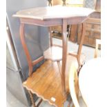 An Edwardian mahogany hexagonal table.