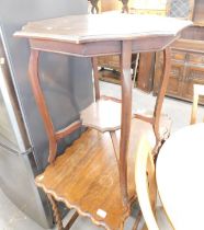 An Edwardian mahogany hexagonal table.