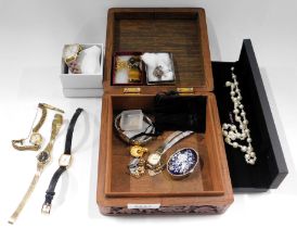 A carved hardwood jewellery box and contents, to include sweet dreams ladies wristwatch, silver cruc