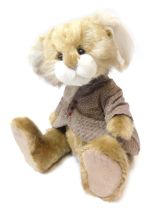 A Charlie Bears Bears with Personalities Collection rabbit, in chequered waistcoat, bearing label, C