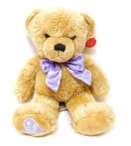 A Keel Toys plush blonde Teddy bear, with purple bow and Best Mum heart foot, 35cm high.