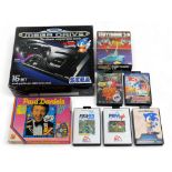 A Sega Megadrive and games, including Sonic Spinball, Sonic The Hedgehog, Fifa Soccer 95, Fifa Socce