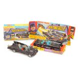 A Corgi Toys diecast Batmobile, with Batman and Robin, boxed.