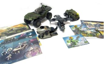 A group of unboxed Mega Blocks Halo vehicles, including Warthog, Ghost, Pelican etc, with assembly i
