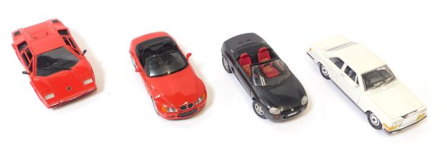 Four diecast vehicles, comprising a UT model 1-18 scale BMW Z3, Polistil Tonka Lamborghini Countach