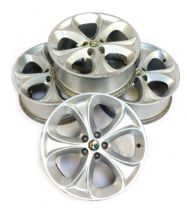 A set of four Alfa Romeo alloy wheels, 47cm diameter. (AF)