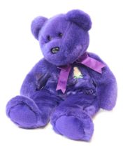 A TY Beanies Princess Diana Commemorative Bear, purple with white rose (1997).