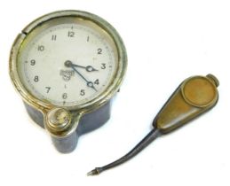 A 1930's Smith car clock, and a Joe Lucas oil can. (2)