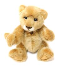 A Charlie Bears lion cub Teddy bear, bearing label, CB151578, 32cm high.