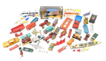 A group of diecast playworn vehicles, to include Corgi, Dinky and others, racing car, tractor, bus,