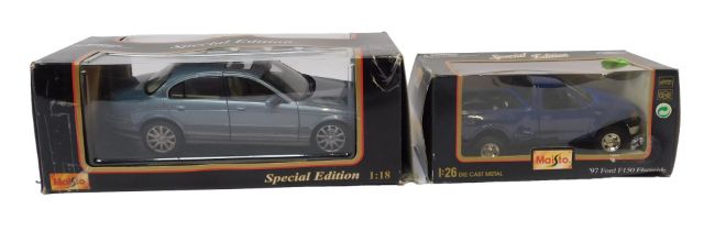 Maisto 1:18 and 1:26 scale diecast vehicles, comprising 97 Ford F150 flare side, and a Jaguar S type