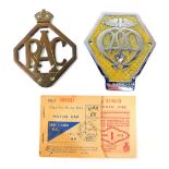 AA and RAC badges, together with a Motor Fuel ration book. (3)
