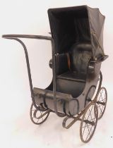 A Victorian pushchair, the arched back with a moulded roof, stepped feet, with spoke wheels, 109cm h