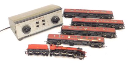 A Hornby OO gauge class 5972 Hogwarts Castle, 4-6-0, and first class coach and brake coach (x2). (1