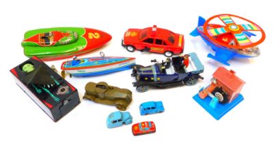 Japanese and Chinese tinplate clockwork toys, to include speedboat, space station, fire truck, water