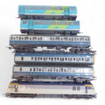 Lima and Hornby OO gauge diesel locomotives, including class 117 three car DMU in BR blue and grey,