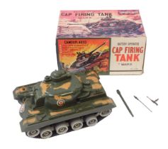 A Marx battery operated cap firing camouflage battery operated tank, boxed.