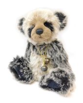 A Charlie Bears panda, with articulated limbs, bearing label, 40cm high.