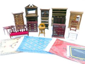 A collection of doll's house furniture, including dresser, mirrored wardrobe, chest on chest, chest
