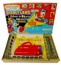 A Chad Valley presents Disneyland The Giver Show projector, with 112 colour slides, boxed.