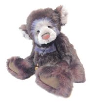 A Charlie Bears purple articulated Teddy bear, two tone colouring, bearing label, 46cm high.
