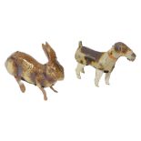 Two tinplate clockwork animals, comprising a British made hopping hare, and a German DRSM dog, lacki