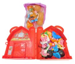 A Mr Potato Heads and Family Dwelling Disney Hasbro toy set, and accessories in farm yard, barn and