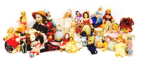A group of collector's dolls, to include Eastern collector's dolls, celluloid dolls, puppets, etc. (