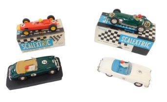 Four Scalextric cars, comprising the BRM C59, Mercedes 190 SL, Ferrero Rocher Porsche 86, two with o