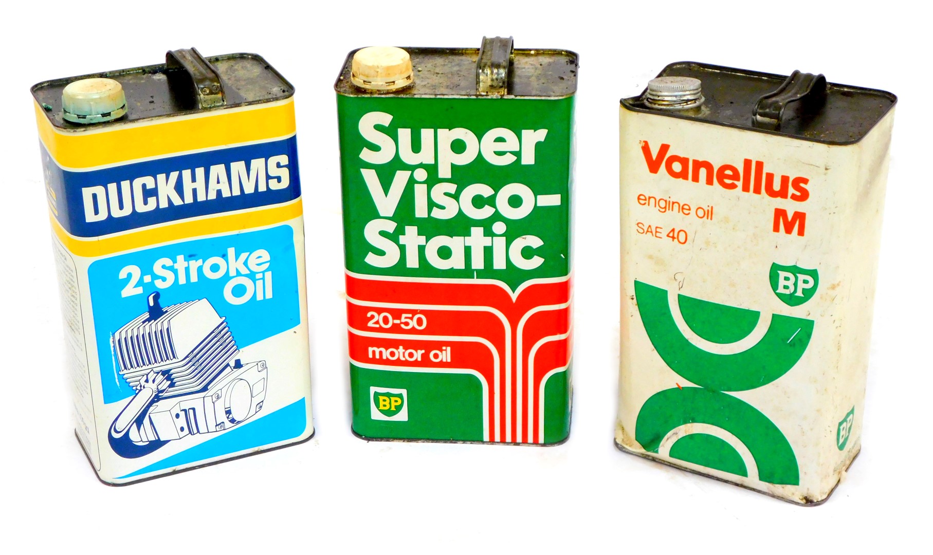 Three vintage oil cans, comprising Duckham's Two Stroke Oil, Vanellus BPM Engine Oil SAE40, BP Super
