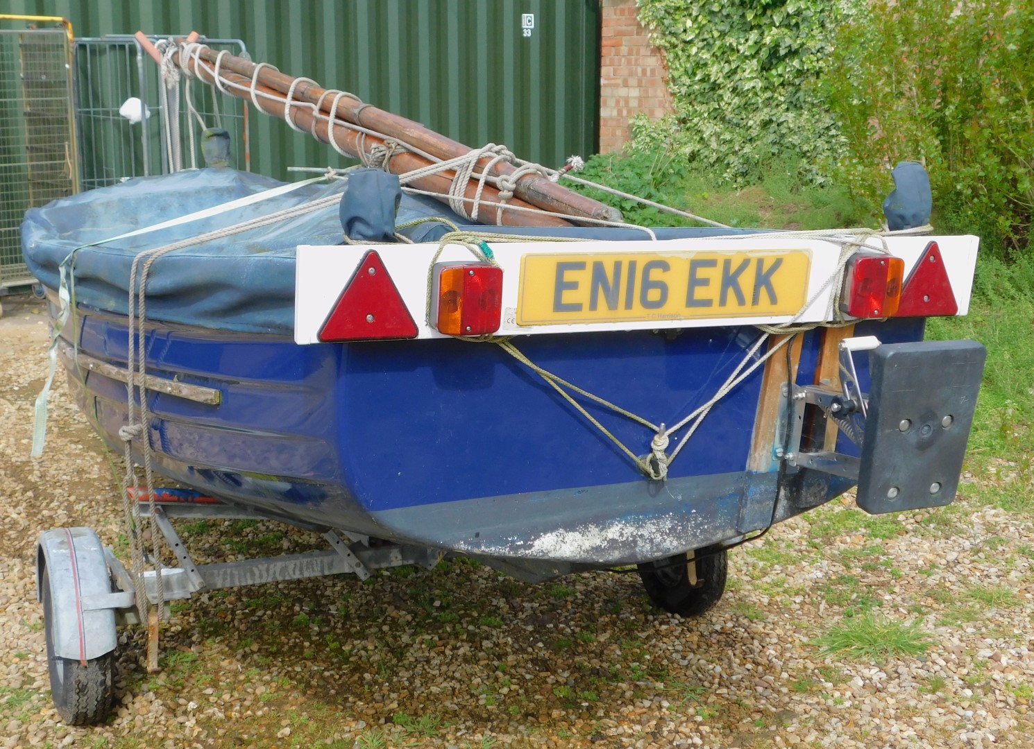 A 12ft blue G.R.P Clinker Sailing Dingy, with a mahogany gunwale with brass fittings, with Neil Pryd - Image 3 of 6