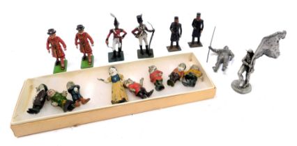 Painted lead soldiers and figures, comprising cavalry officers, station masters, and a set of Snow W