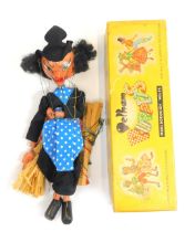 A Pelham Puppets standard puppet, of female in blue spotted dress, boxed.
