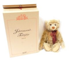 A Steiff blonde plush jointed Teddy bear, number 43, with labels and tag, boxed.