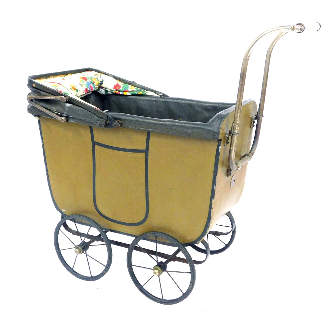 A 1950s Triangtois (Line Bros ltd) doll's pram, with a brown painted base, and floral hood, 66cm hig