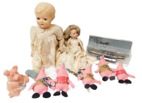 Two dolls, comprising a German bisque headed doll, on wooden painted body, the head stamped Germany