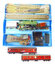 A Hornby Dublo electric train set, and two Hornby Dublo carriages, boxed. (1 box and two items)