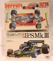 Two Tamiya 1:12 scale kit built racing car models, comprising JPS Mk 3 Team Lotus, and a Ferrari 312