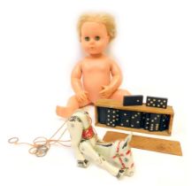Toys and games, comprising a plastic blonde haired doll, cased dominoes, and an articulated metal do