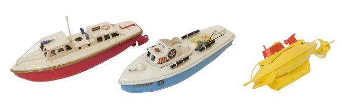 Three British made tinplate boats, to include The Victor Submarine and another. (3)