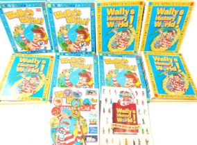 A group of Where's Wally Wally's World magazines, each contained in a ring binder, together with two