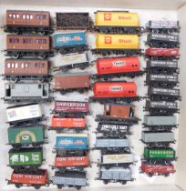 Hornby, Dapol, Bachman and other OO Gauge rolling stock, including brake vans, Lyle's Golden Syrup b