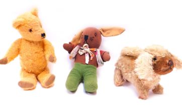 Three early to mid 20thC bears, comprising a plush jointed dog, plush jointed Teddy bear, and a knit