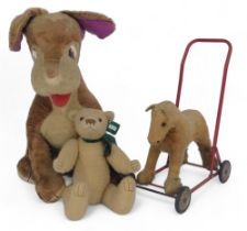 A Merrythought 'Tramp' plush jointed dog, a 1950's Chilton push-along-horse, and a Harold Teddy Bear