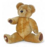 A 1950's Chad Valley plush jointed Teddy bear, bearing label to foot, 36cm high.