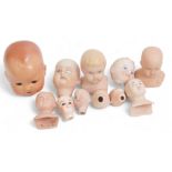 German and English porcelain doll's heads, including BND London, etc. (1 box)